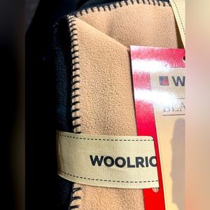 Woolrich reversible 2 color wrap .   Old, but brand new!  Nice retro gift
